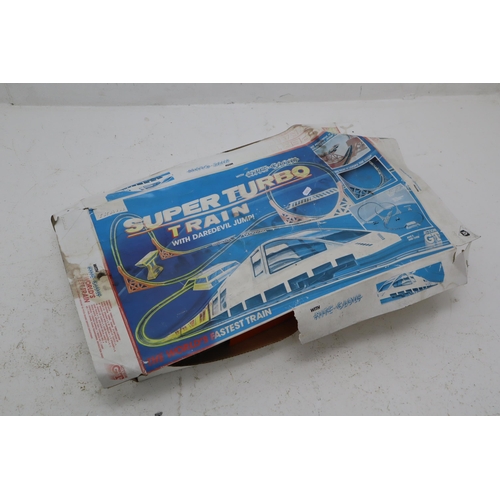 603 - A Boxed Retro Tyco Super Turbo Train, All Pieces Appear To Be There With Instructions. Untested.