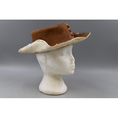 673 - An Animal Hide Cowboy Hat