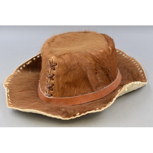 673 - An Animal Hide Cowboy Hat