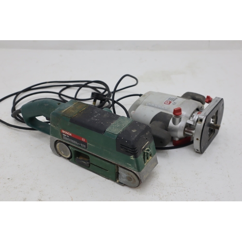 664 - A Bosch PBS 75 Belt Sander and A Performance Power 1020w Router. Both Power on When Tested.