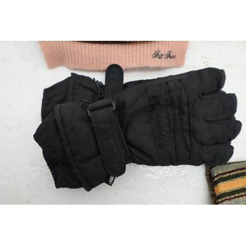 693 - A Large Selection of Assorted Winter Clothing Items.