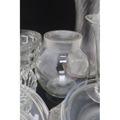 702 - Selection of Glassware including Vases, Bowls, cooking dishes and more