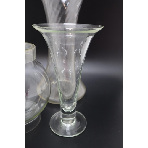 702 - Selection of Glassware including Vases, Bowls, cooking dishes and more