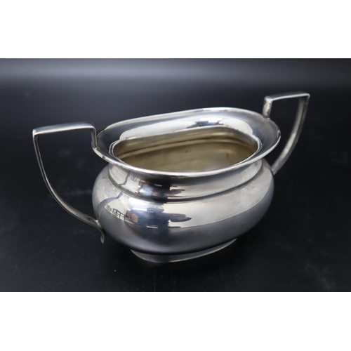 7 - A Silver Plated Three Piece Art Deco Tea Set. Includes Tea Pot, Milk Jug and Sugar Bowl.