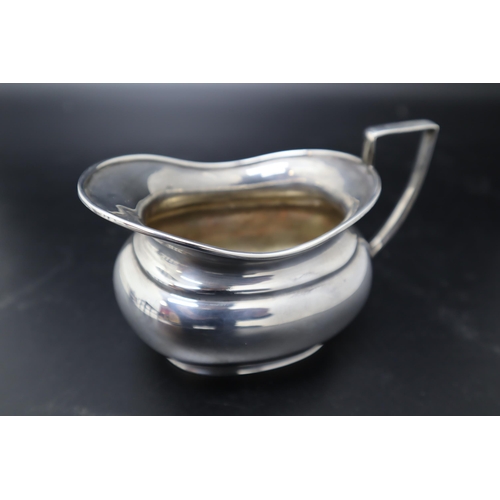 7 - A Silver Plated Three Piece Art Deco Tea Set. Includes Tea Pot, Milk Jug and Sugar Bowl.