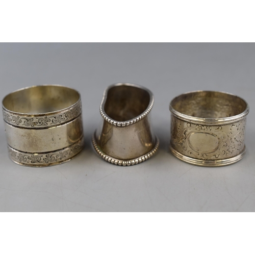 14 - Two Hallmarked Sheffield Silver Napkin Rings, With Silver Plated Napkin Ring on Silver Plated Tray.