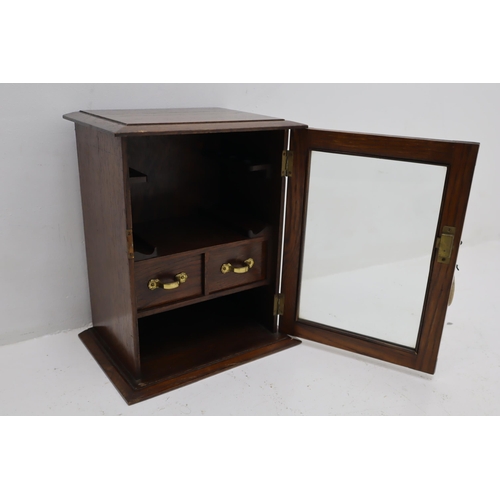 277 - A Glass Door Wooden Smokers Cabinet, With Key, Two Drawers And Ciger Holders. Approx 8