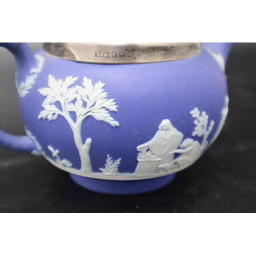 27 - A Wedgwood Jasperware Teapot, With Hallmarked Birmingham Silver Trim. Teapot AF.