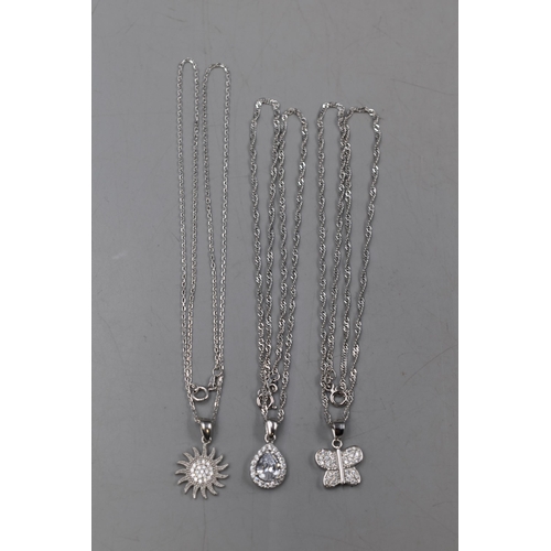 30 - Three Silver 925 Diamante Pendants on Silver 925 Chains. Largest Pendant Approx. 2cm.