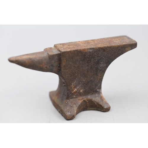 306 - Five Vintage miniature Cast Iron Anvils