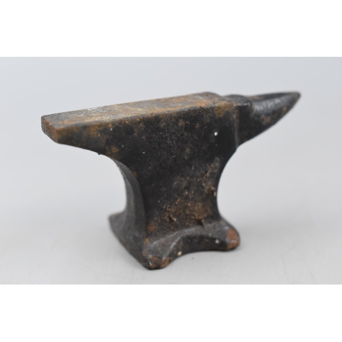 306 - Five Vintage miniature Cast Iron Anvils