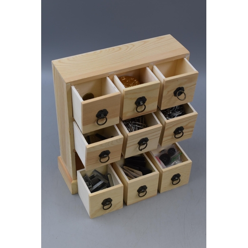 312 - Nine Drawer Wooden Storage Chest Containing a Selection of Stationery Items