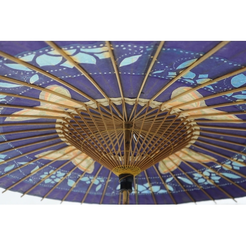 313 - Oriental Hand painted Bamboo Parasol and a ladies Fabric Parasol with Bamboo Handle