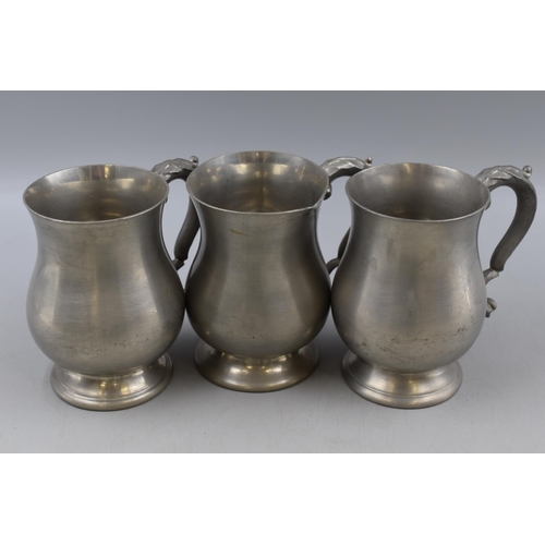 348 - A Selection of Eight Assorted Pewter Tankards.