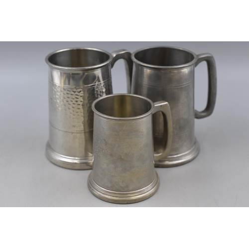 348 - A Selection of Eight Assorted Pewter Tankards.