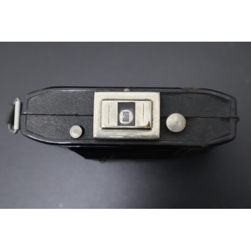 353 - A Dehel folding camera and case.