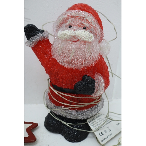 385 - A Selection of Assorted Christmas Decorations. Includes Tree, Wreaths, LED Santa Waving and More.