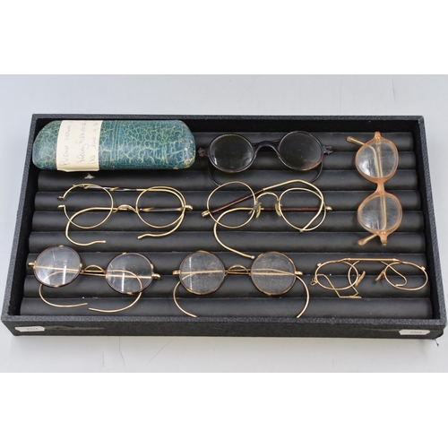 107 - Seven Pairs of Vintage Round Framed Glasses one with Case