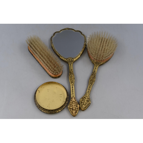 414 - Vintage Vanity Set in Brass with Floral Decoration to include Clothes Brush, hairbrush, Mirror and o... 