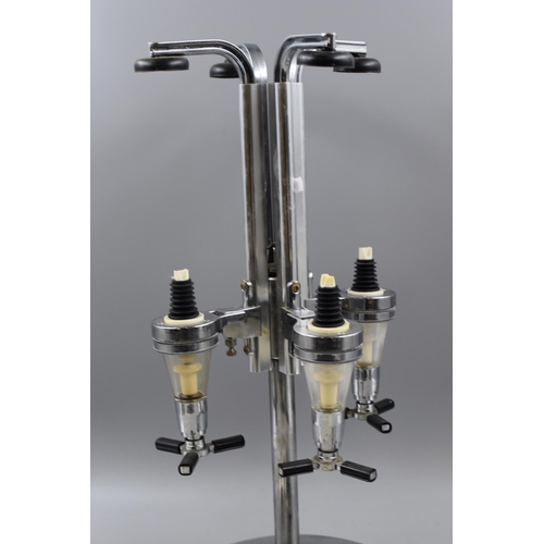 436 - A Metal Four Spirit Optic Stand, With A Selection of Five Other Spirit Optics. Approx 21