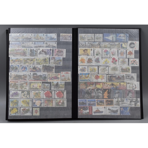 450 - Stanley Gibbons Album Containing a Large Selection of Stamps From New Zealand, Isle of Man and Guern... 