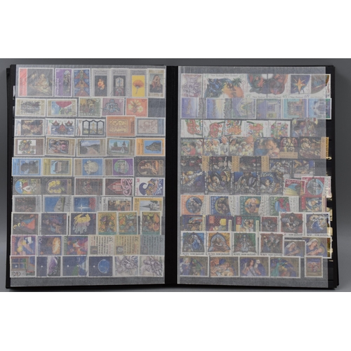 450 - Stanley Gibbons Album Containing a Large Selection of Stamps From New Zealand, Isle of Man and Guern... 