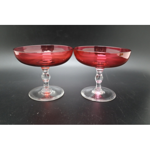 220 - Selection of Coloured Glassware including Long stemmed Wine Glasses Fruit Bowls and Vases