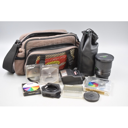 495 - A Fujica STX-1 Camera, With Bag and Accessories. Includes Lenses, Filters, Flash and More.