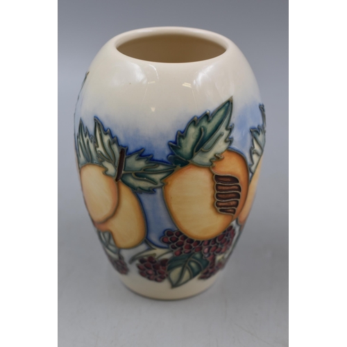 263 - Moorcroft Vase with a peaches and grape design marked Made in England with the Iron Cypher and Dated... 