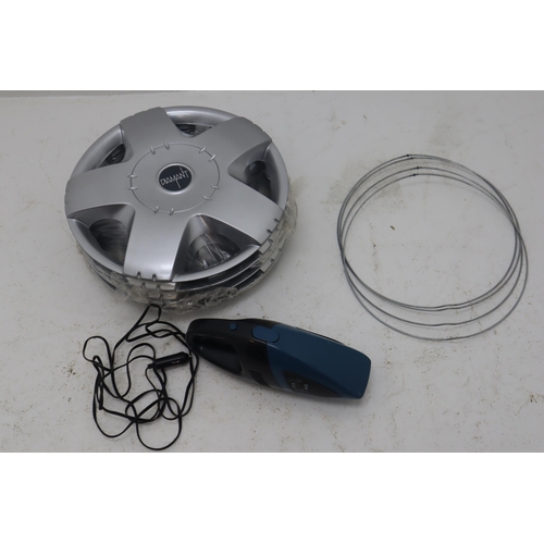 569 - A Selection of Car Accessories, Inlcudes Wheel Covers, Car Vacuum, Glass Wizard and More.