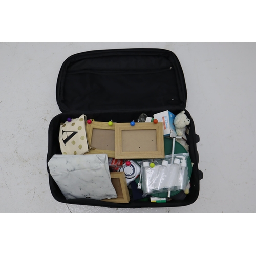 648 - Revelation Suitcase (63cm x 38cm) containing a Large Selection of mixed Contents