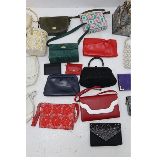 650 - Two Boxes of Assorted Women's Handbags.