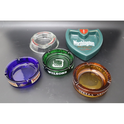 629 - Selection of Vintage Branded Ashtrays including Stella Artois, Players, Worthington and More