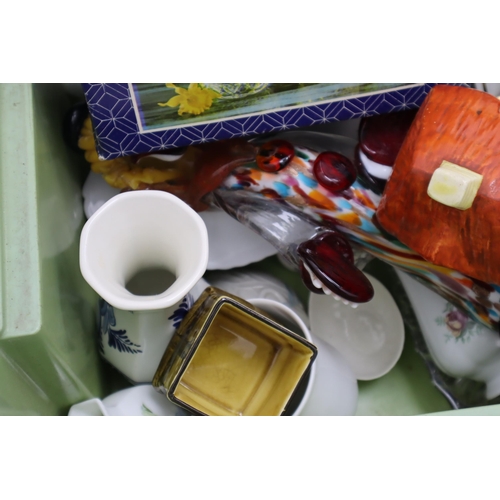 634 - Two Boxes Containing A Selection of Mixed Glassware and Ceramics. Includes Pyrex, Murano Style Clown... 