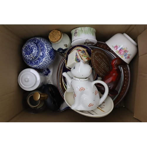 634 - Two Boxes Containing A Selection of Mixed Glassware and Ceramics. Includes Pyrex, Murano Style Clown... 