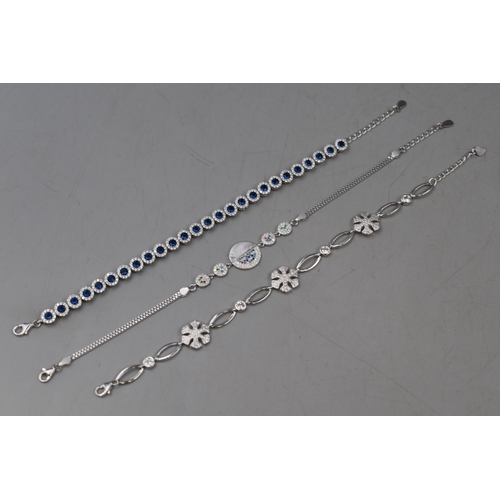 12 - Three Silver 925 Bracelets with Coloured and/or Diamante detailing