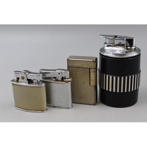 29 - A Selection of Four Vintage Cigarette Lighters, Includes Ronson, Rolstar and Zaima.