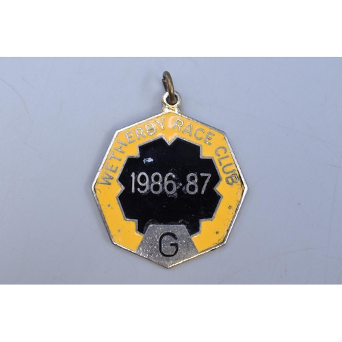 94 - Selection of 12 Enamelled official Racecourse Members Badges (Dating from 1986 to  2001)