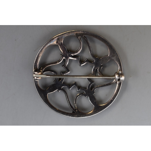 3 - A Hallmarked Silver Celtic Style Circular Brooch.