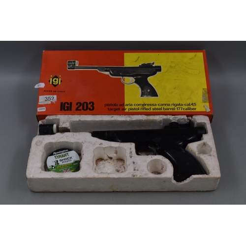 212 - An Italian IGI 203 Target Air Pistol .177 Caliber, With Box and Tin of Pellets. Good Compression.