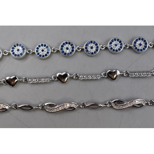 38 - Three Silver 925 Bracelets with Diamante, Heat and Infinity design