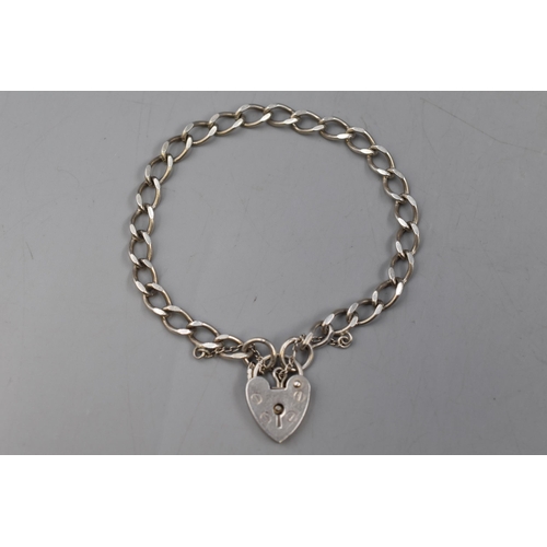 46 - Hallmarked London Silver bracelet with Heart Clasp