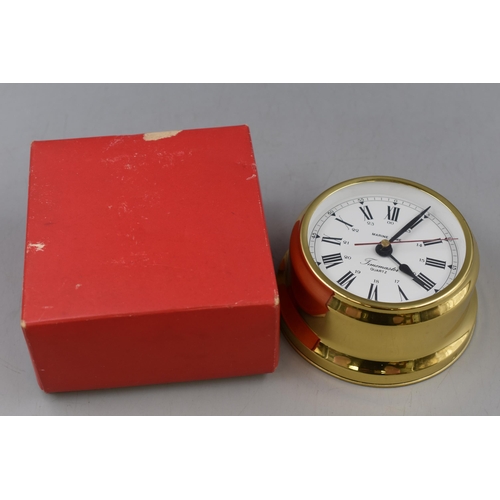 114 - A Boxed Brass Timemaster 'Marine Time' Clock.