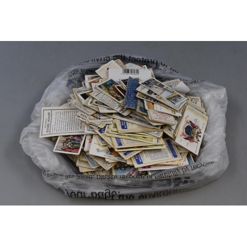 365 - A Large Quantity of Unsorted Cigarette Cards.