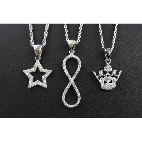 12 - A Selection of Three 925. Silver Pendants on 925. Silver Chains. Includes Star, Crown and Infinity.