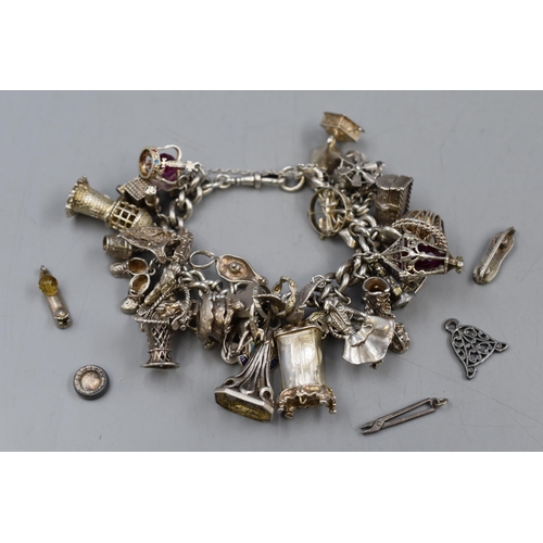 15 - Silver Hallmarked Charm Bracelet marked with Lion on every Link and and has a Dog Grip Clasp contain... 