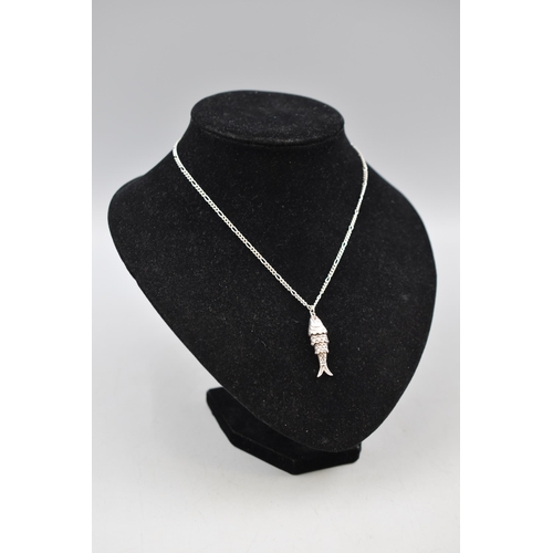 16 - A Hallmarked Silver Articulated Fish Pendant on 925. Silver Chain.