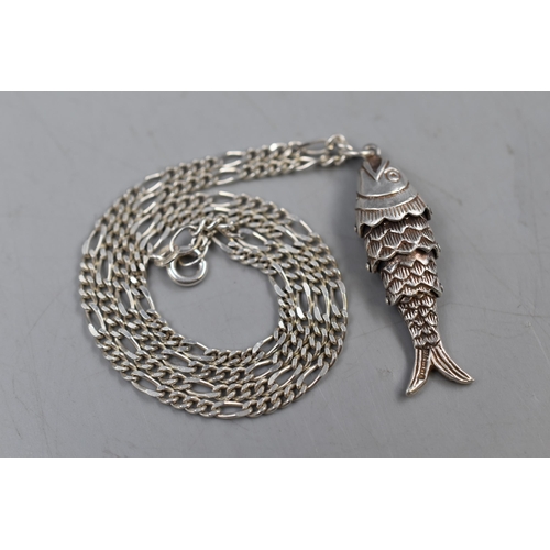 16 - A Hallmarked Silver Articulated Fish Pendant on 925. Silver Chain.