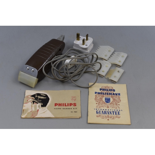 179 - Merit Slinky in original Box and a Philips Home Barber kit with Attachments and Paperwork