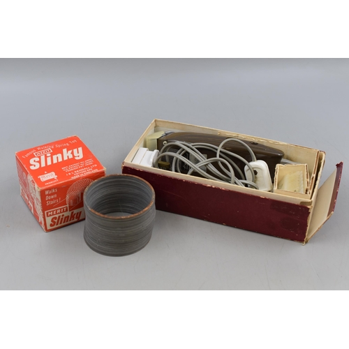 179 - Merit Slinky in original Box and a Philips Home Barber kit with Attachments and Paperwork